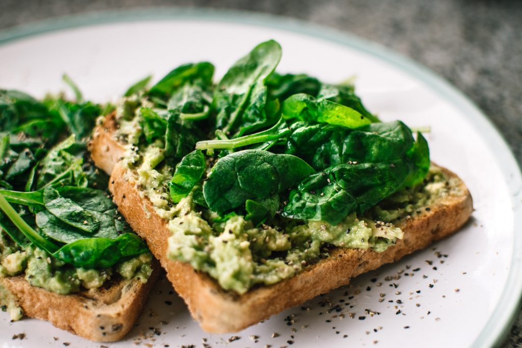 avocado toast loaded with spinach